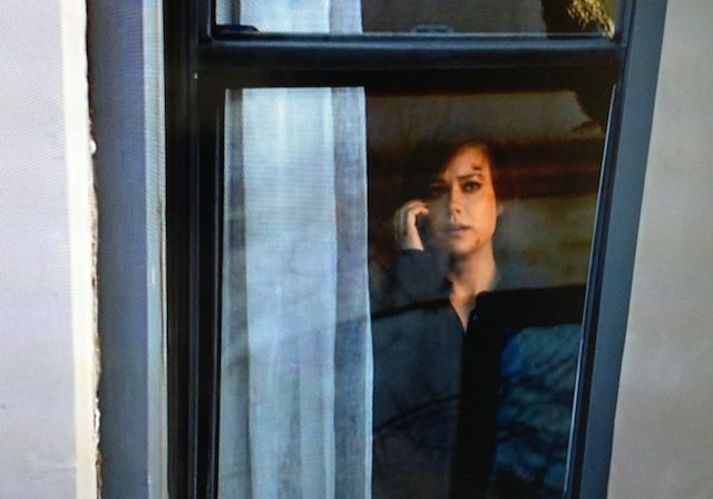 The Blacklist: Elizabeth Keen looking out her window